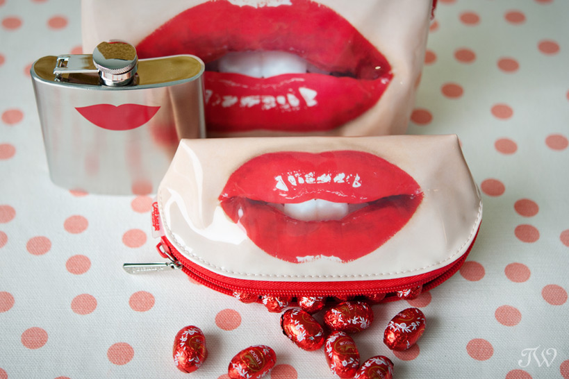 cosmetic bags with red lip prints photographed by Tara Whittaker