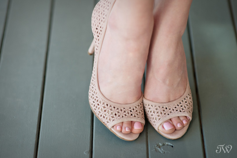 girl wearing pink wedding shoes photographed by Tara Whittaker