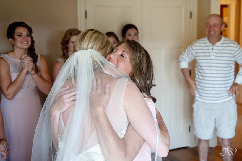 Mother of the bride hugs her daughter Tara Whittaker Photography