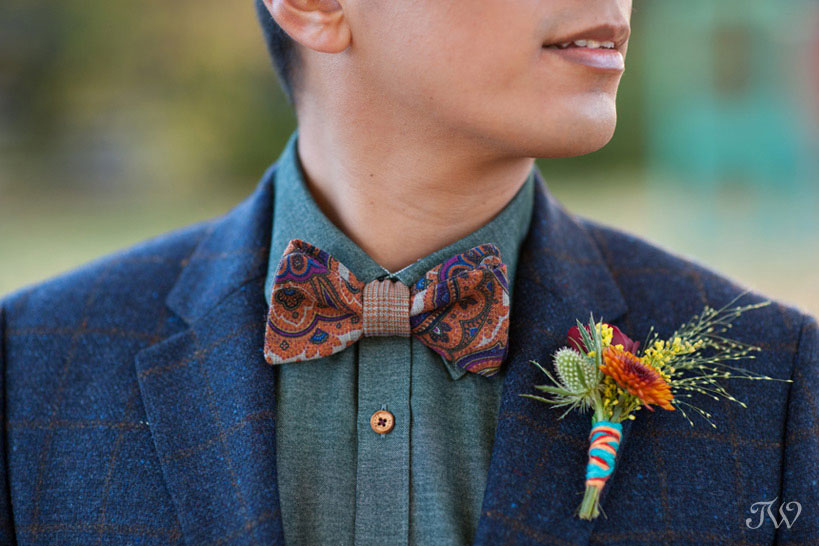 Boutonniere wrapped in colourful yarn captured by Tara Whittaker Photography