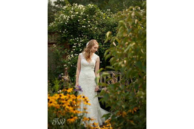 bride poses before her Heritage Park wedding captured by Tara Whittaker Photography