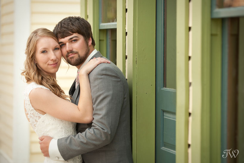 bride & groom on Main Street at Heritage Park captured by Tara Whittaker Photography