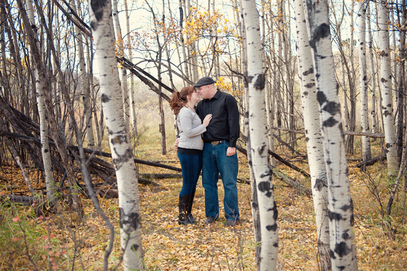 couple pose during their Fish Creek Park engagement session captured by Tara Whittaker Photography