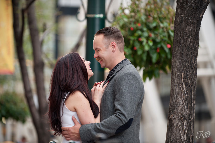 couple laugh during their engagement session captured by Tara Whittaker Photography