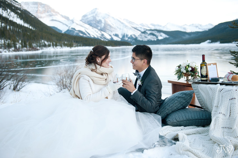 bride and groom celebrate at their winter wedding captured by Tara Whittaker Photography