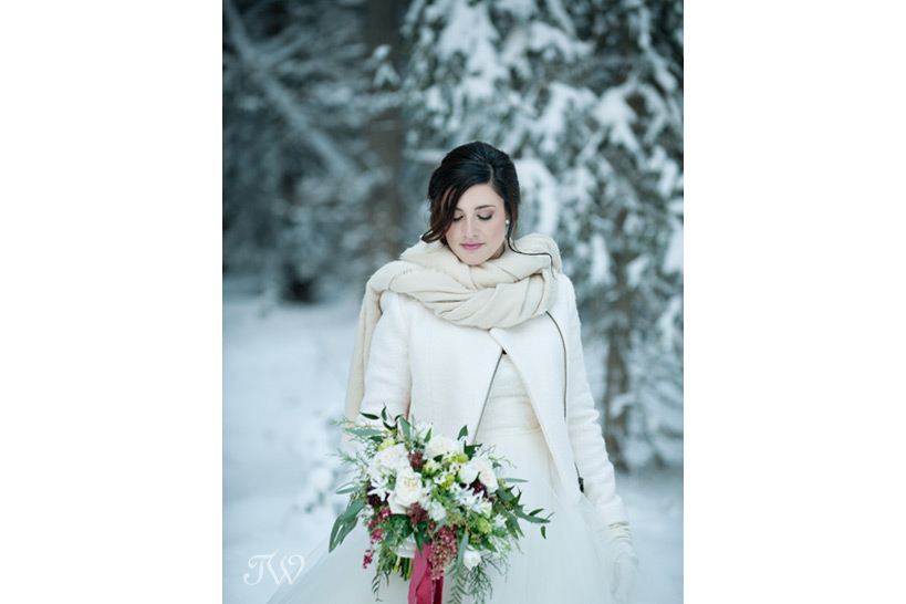 winter bride in the Rocky Mountains captured by Tara Whittaker Photography