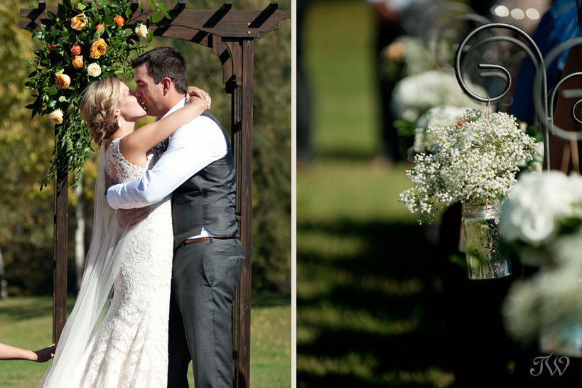 First kiss after a Fernie wedding ceremony captured by Tara Whittaker Photography