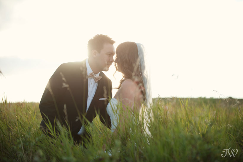 bride and groom at sunset captured by Tara Whittaker Photography