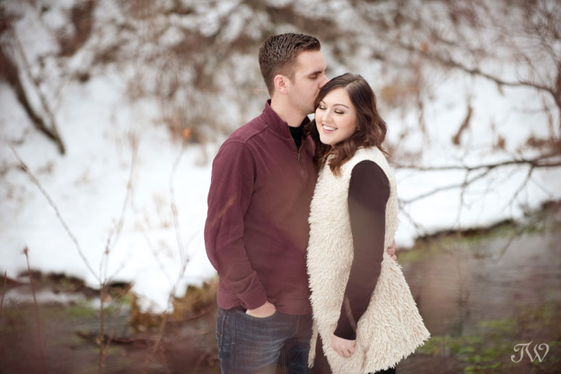 engaged couple pose for photos captured by Tara Whittaker Photography