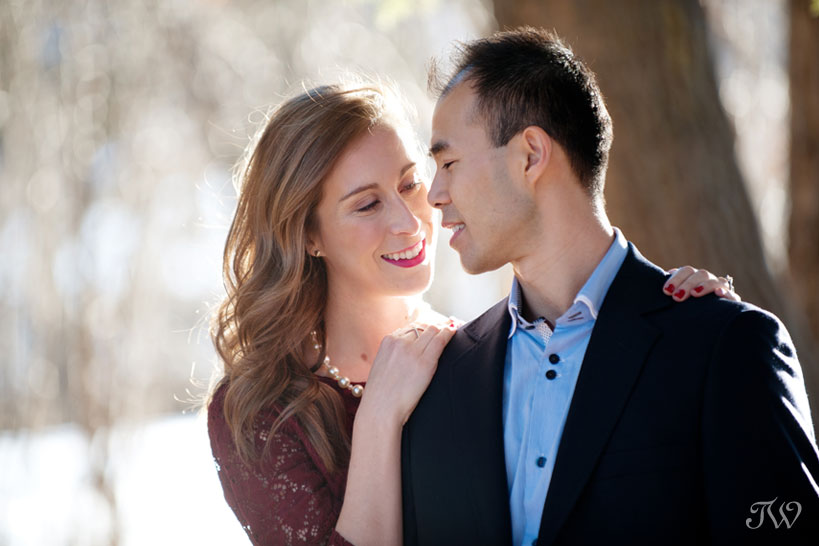 couple pose during their spring engagement session captured by Tara Whittaker Photography