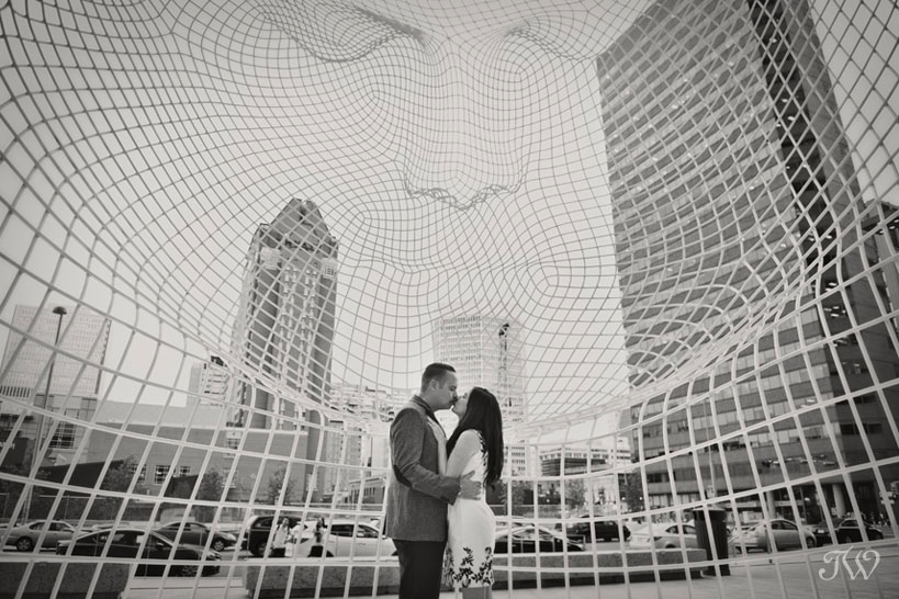 engagement photos at The Bow building in Calgary captured by Tara Whittaker Photography