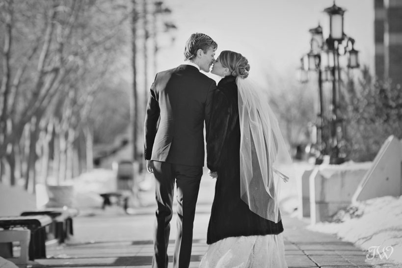 bride and groom kiss winter weddings captured by Tara Whittaker Photography
