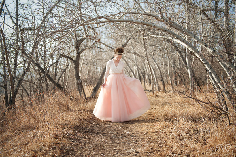 bride wearing a tulle skirt in peach tones captured by Tara Whittaker Photography