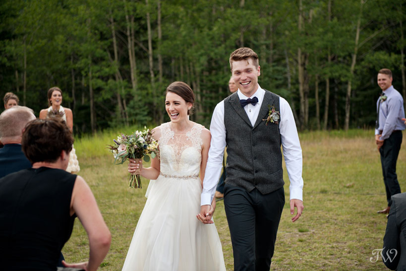 just married at Rundleview Parkette in Canmore captured by Calgary wedding photographer Tara Whittaker