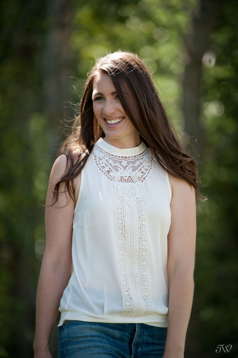 bride smiles during engagement pictures with Tara Whittaker Photography