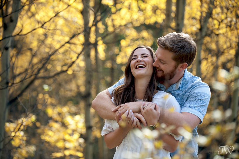love and laughs during a fall engagement session in Kananaskis