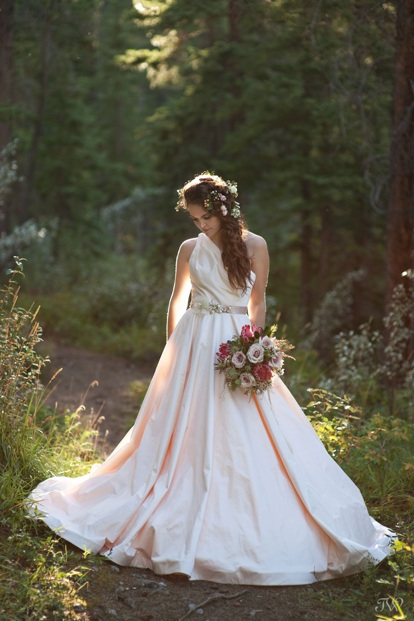 Rocky Mountain bride wearing a blush Romona Keveza gown captured by Calgary wedding photographer Tara Whittaker