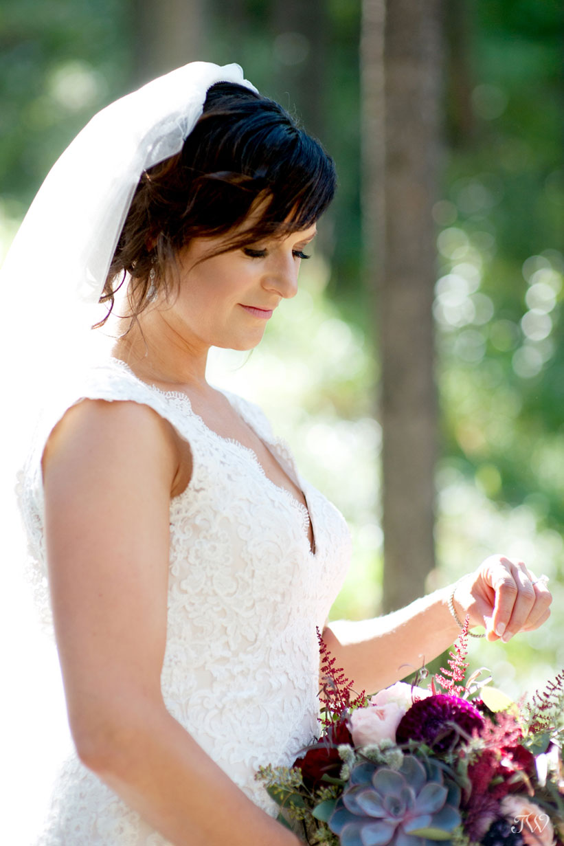 Canmore bride holding her bouquet from Willow Flower Co.