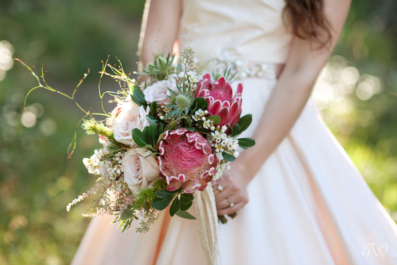 Mountain bride carries protea 2016 bridal bouquet captured by Tara Whittaker Photography