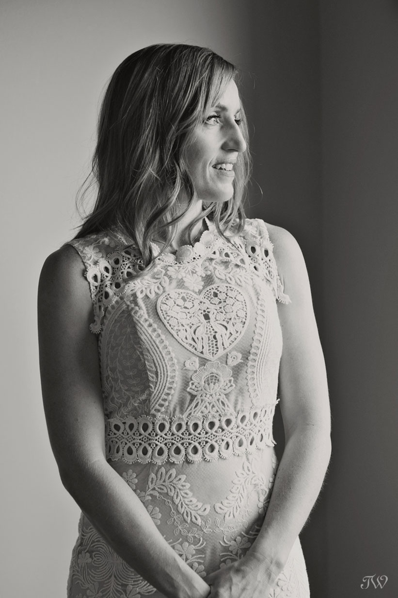 Bride wearing a lace BHLDN gown captured by Calgary wedding photographer Tara Whittaker