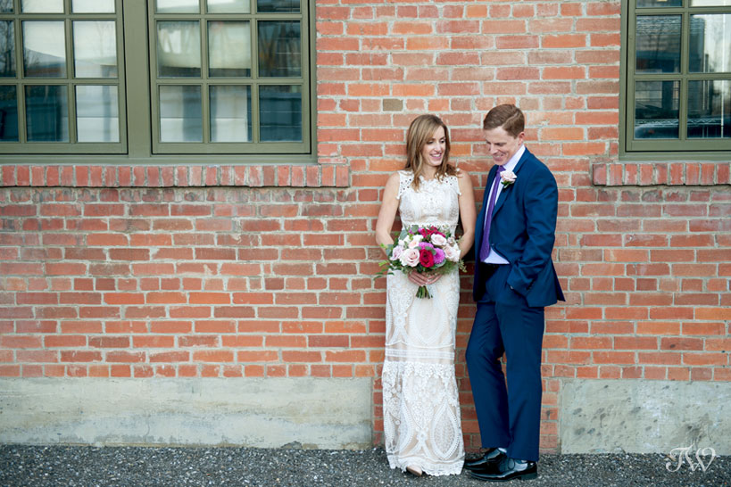 Bride and groom at the Simmons building before their Charbar Calgary wedding