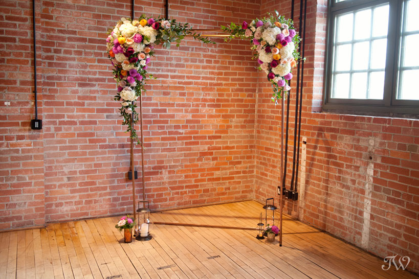 Copper wedding arch from Rus Vintage and Flowers by Janie captured by Tara Whittaker
