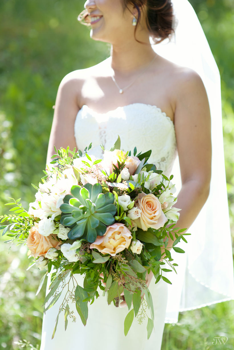 Banff bride with her bouquet from Elements captured by Tara Whittaker Photography