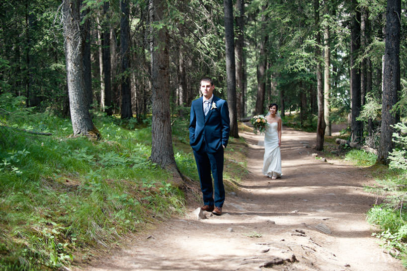 first look during mountain elopement packages with Calgary wedding photographer Tara Whittaker