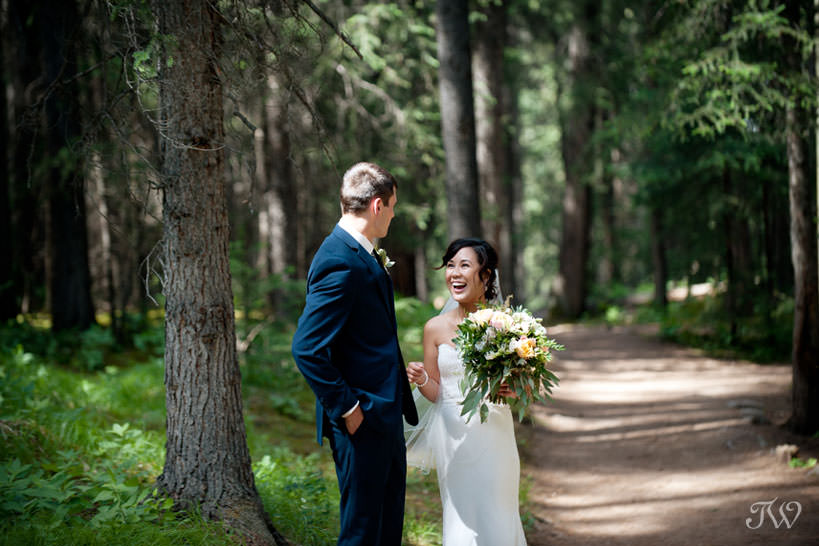 first look during mountain elopement packages with Calgary wedding photographer Tara Whittaker