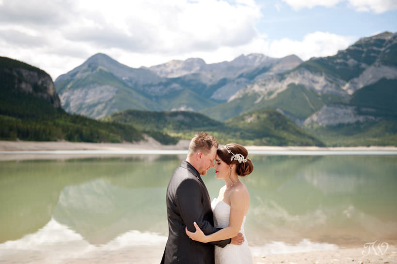 bride and groom at their Rocky Mountain elopement at Barrier Lake captured by Tara Whittaker Photography