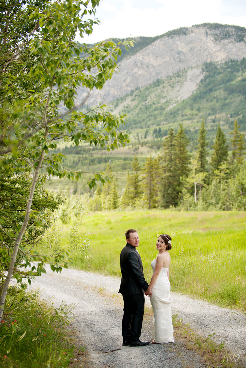 bride and groom at their Rocky Mountain elopement at Barrier Lake captured by Tara Whittaker Photography