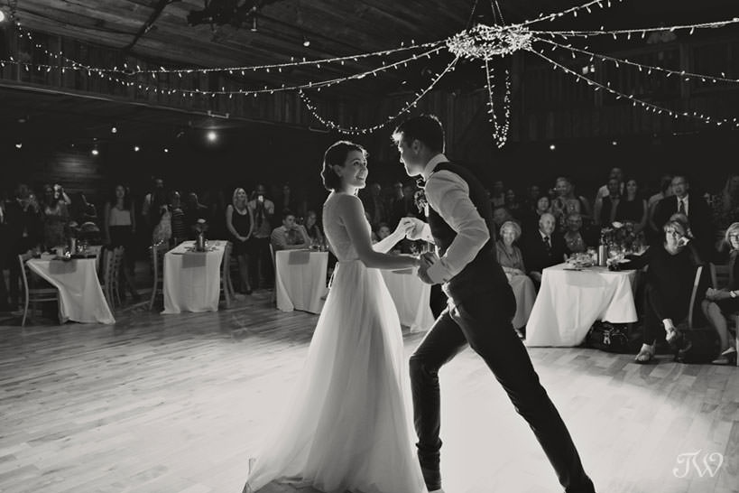 Bride and groom dance during their Cornerstone Theatre wedding captured by Tara Whittaker Photography