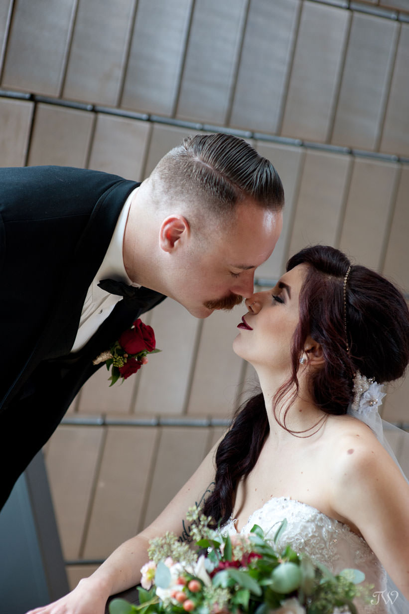 bride and groom at the National Music Centre captured by Calgary wedding photographer Tara Whittaker