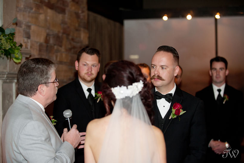 wedding ceremony at a Lake House wedding captured by Calgary wedding photographer Tara Whittaker
