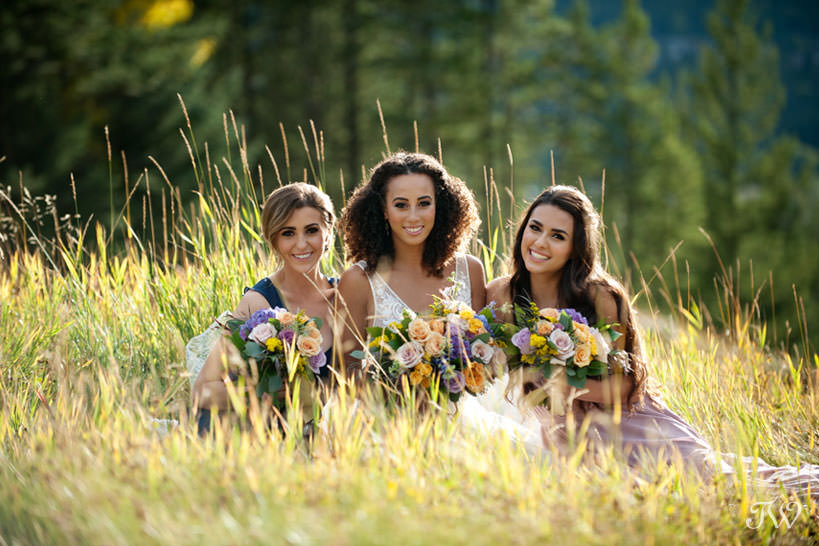 bridal party in Canmore at a Silvertip wedding captured by Calgary wedding photographer Tara Whittaker