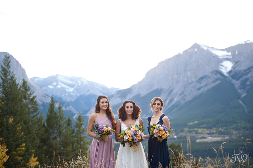 bridal party in the Rockies at a Silvertip wedding captured by Calgary wedding photographer Tara Whittaker
