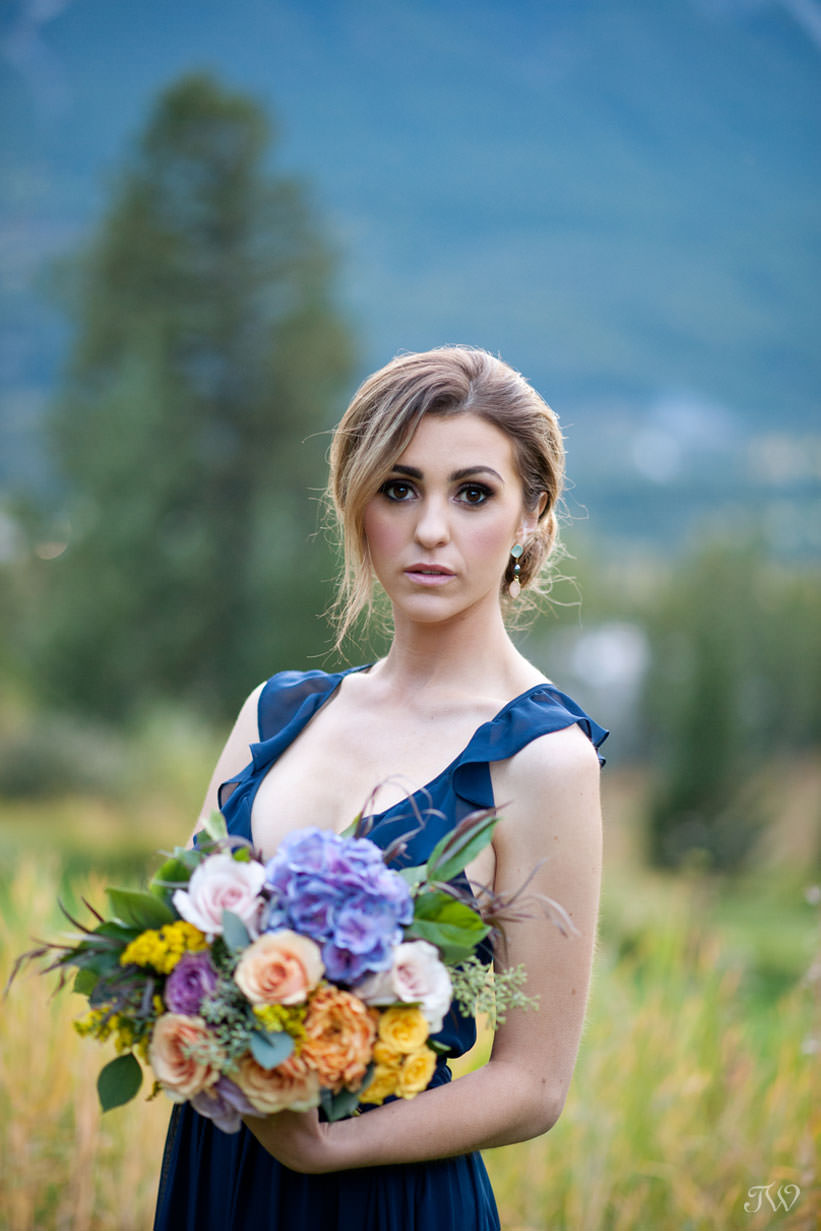 fall bridesmaid in Joanne August at a Silvertip wedding captured by Calgary wedding photographer Tara Whittaker