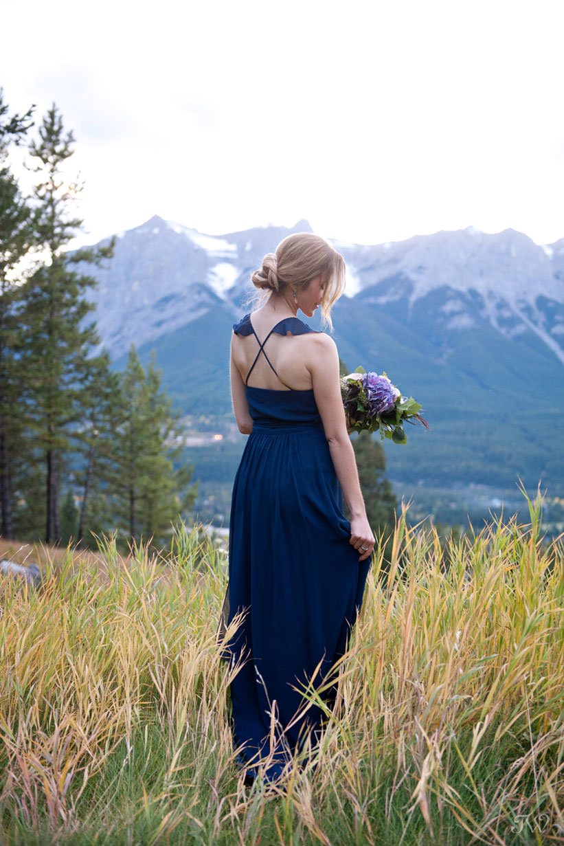 fall bridesmaid in Joanna August at a Silvertip wedding captured by Calgary wedding photographer Tara Whittaker