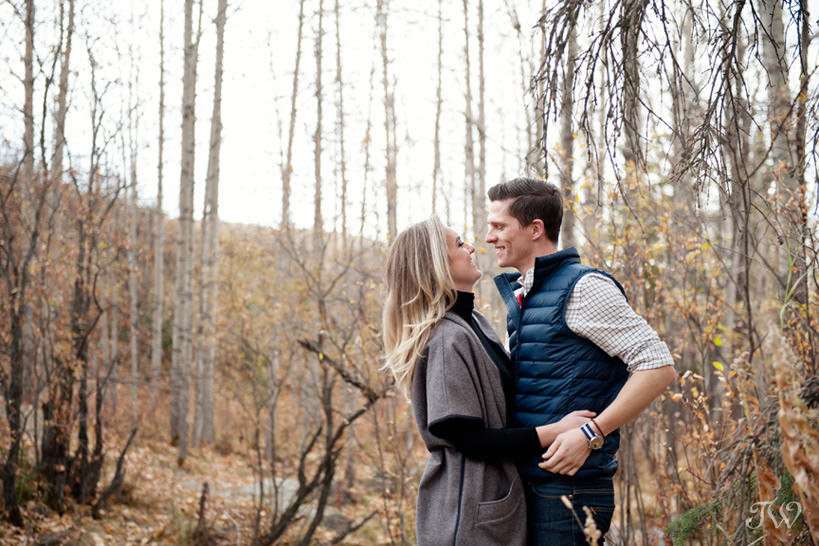 Happy couple during their Big Hill Springs engagement session captured by Tara Whittaker Photography