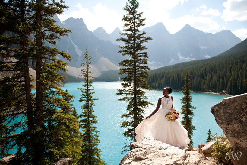 Moraine Lake bride Debol carries a bouquet from Flowers by Janie captured by Tara Whittaker Photography