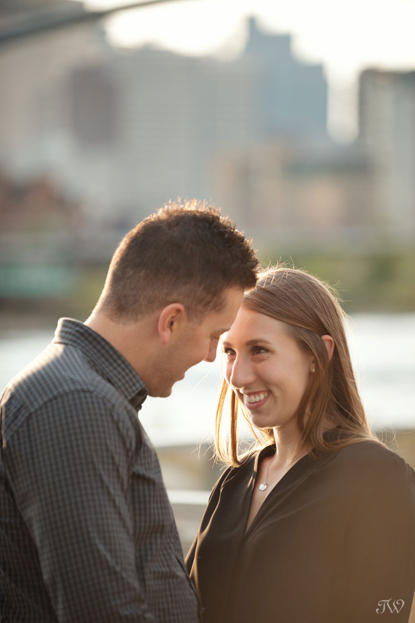 Sweet moment during East Village engagement session captured by Tara Whittaker Photography