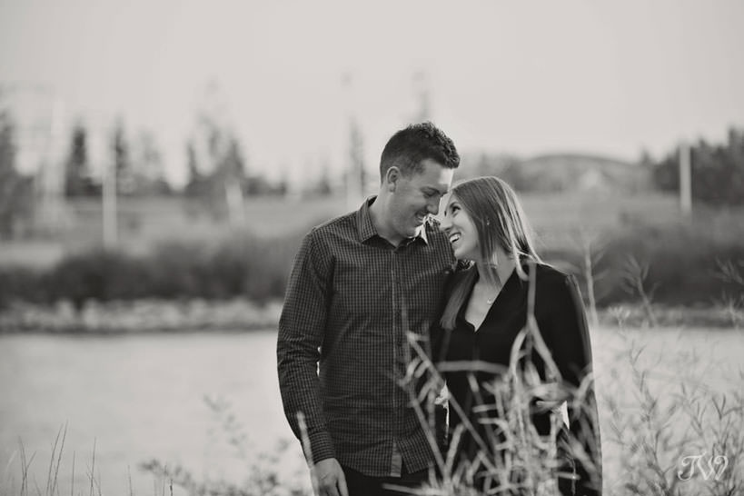 Couple embrace during East Village engagement session captured by Tara Whittaker Photography