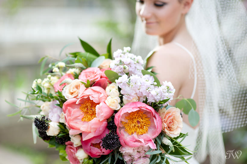 Spring bride carries peonies in this feature of best bridal bouquets by Tara Whittaker Photography