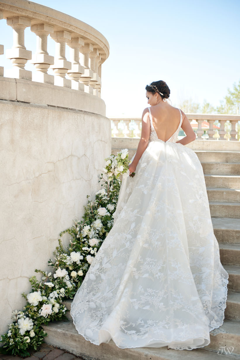 Bride in Lazaro gown at Spruce Meadows captured by Calgary wedding photographer Tara Whittaker