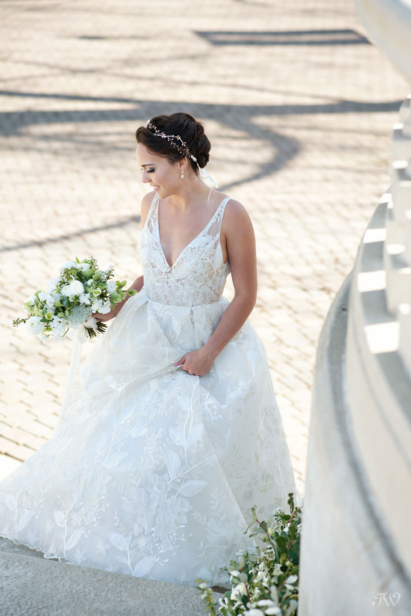 Bride in Lazaro gown at Spruce Meadows captured by Calgary wedding photographer Tara Whittaker