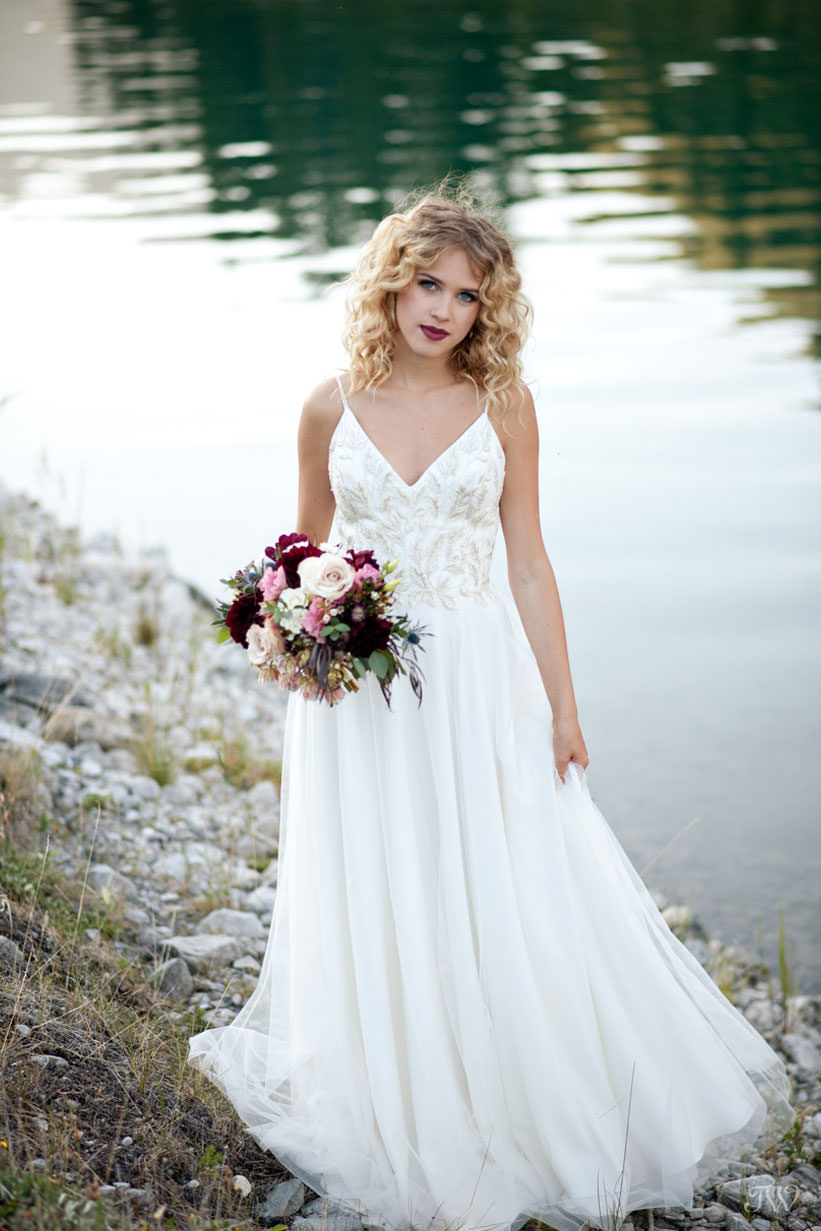 Bride during Canmore wedding photos at Spray Lakes Canals captured by Tara Whittaker Photography