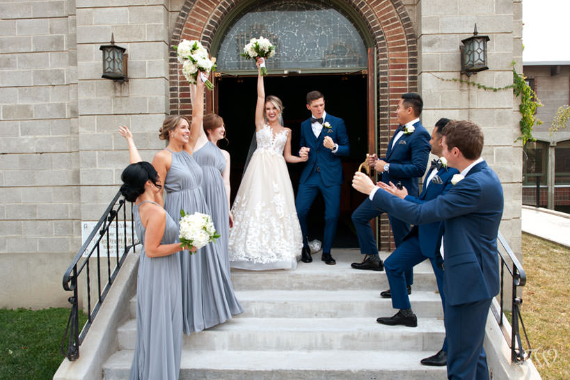 grand exit from St Stephen's Church captured by Calgary wedding photographer Tara Whittaker