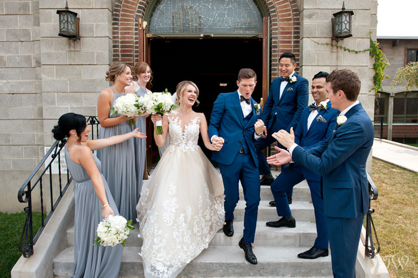 grand exit from St Stephen's Church captured by Calgary wedding photographer Tara Whittaker