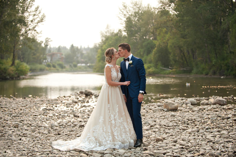 bride and groom at Stanley Park in Calgary captured by Calgary wedding photographer Tara Whittaker