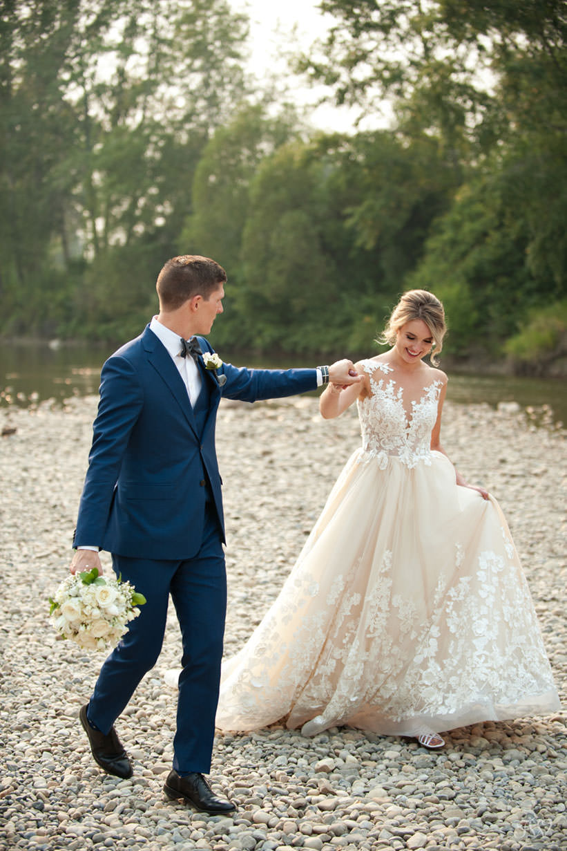 bride and groom at Stanley Park in Calgary captured by Calgary wedding photographer Tara Whittaker